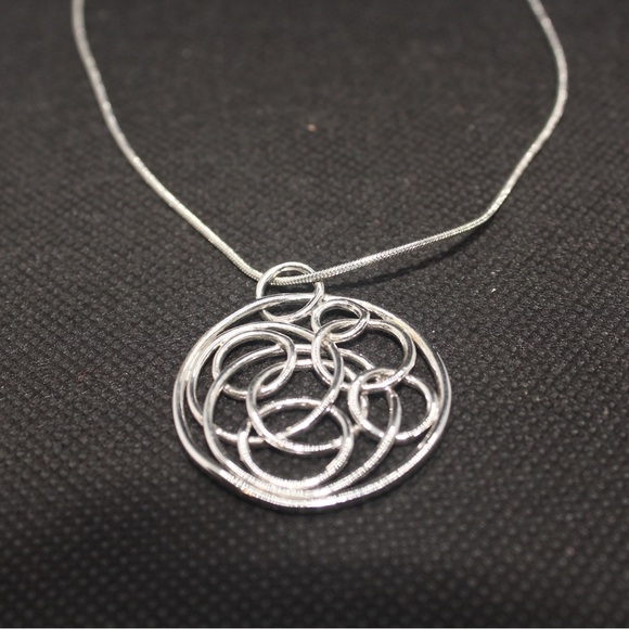 Elegant Silver Swirl Pendant Necklace - Picture 3 of 5